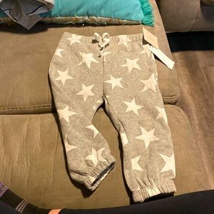 Gray sweatpants with white stars